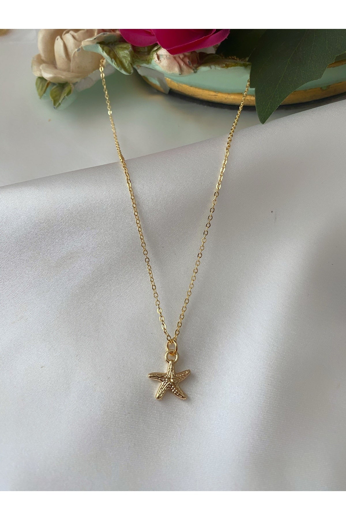 Asia by Leuvoie gold starfish necklace