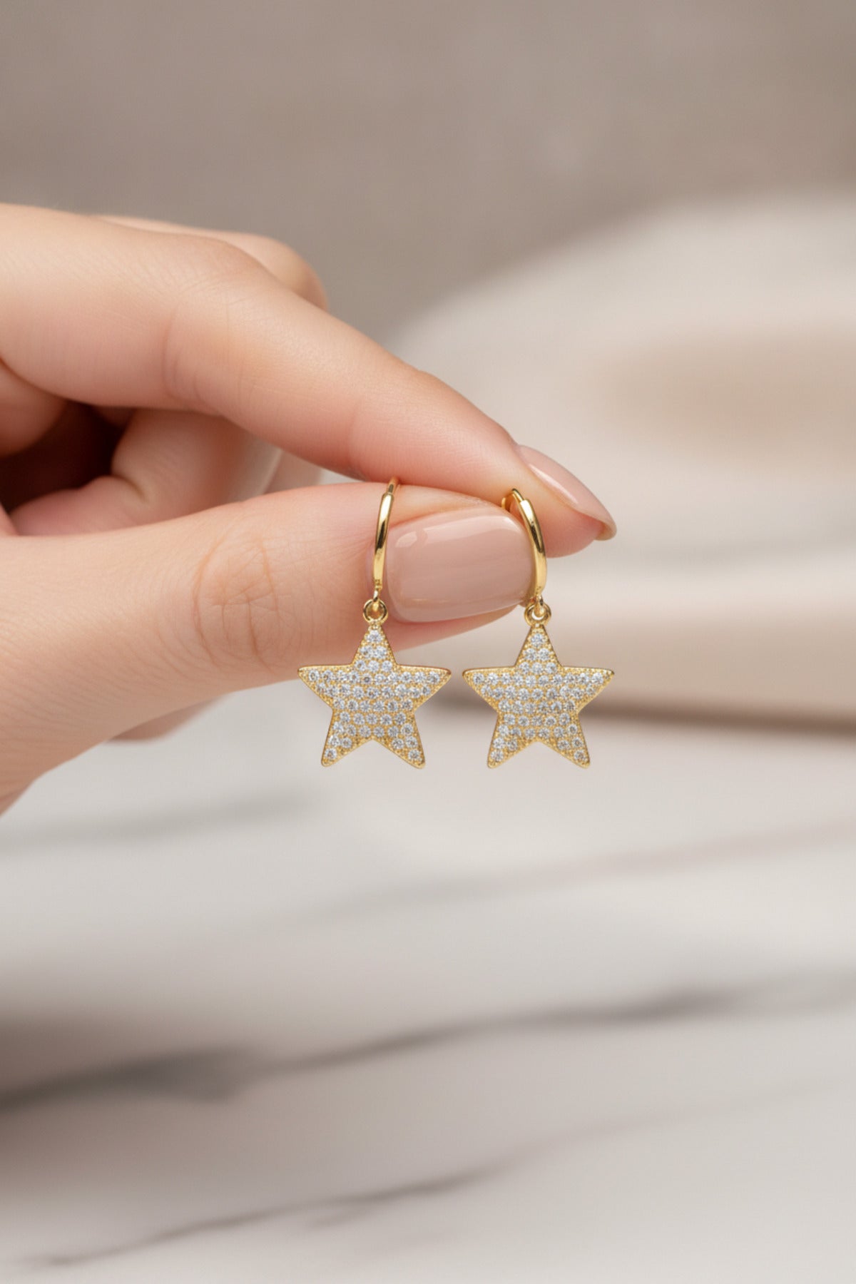 Jack Ferrero Women's Yellow Zircon Star Earrings detail