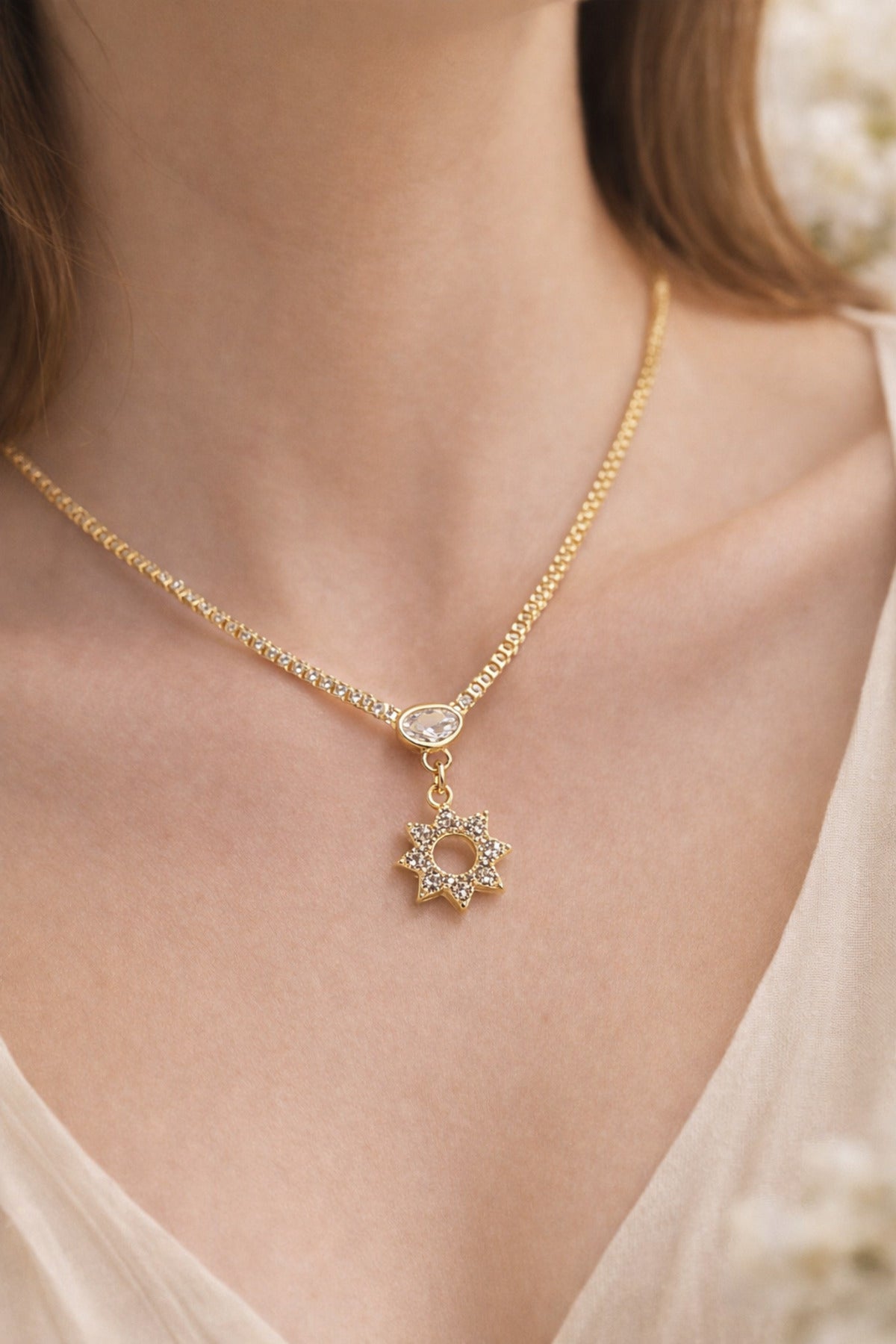 Glowy Stella zircon gold-tone steel necklace
